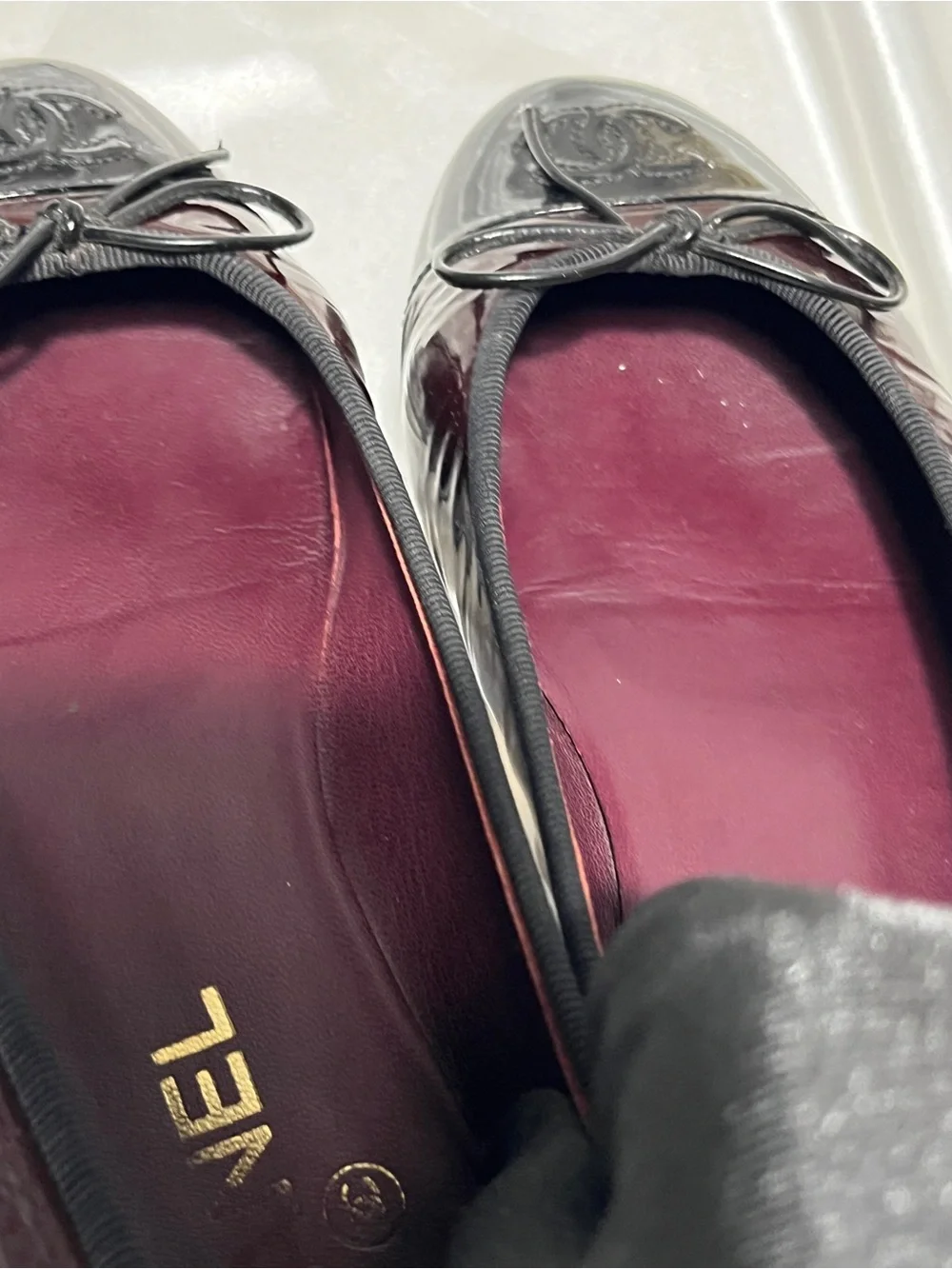 CHANEL Two-Tone Burgundy and Black Cap-Toe Ballerinas